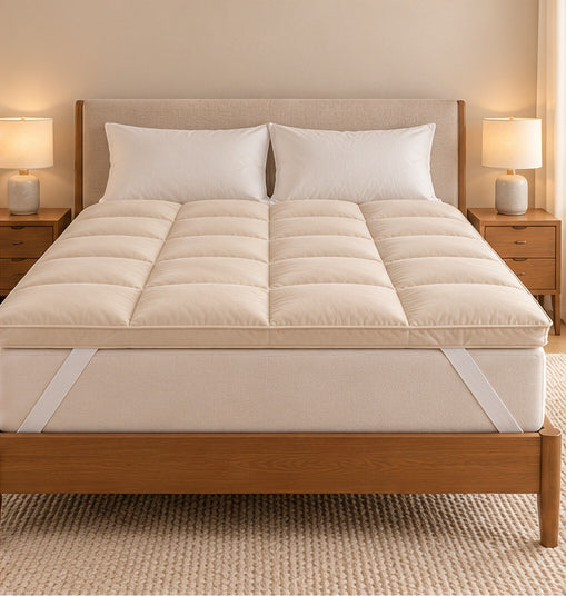 Westy Home beige mattress topper on a bed