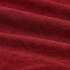 Close-up of maroon terry fabric texture
