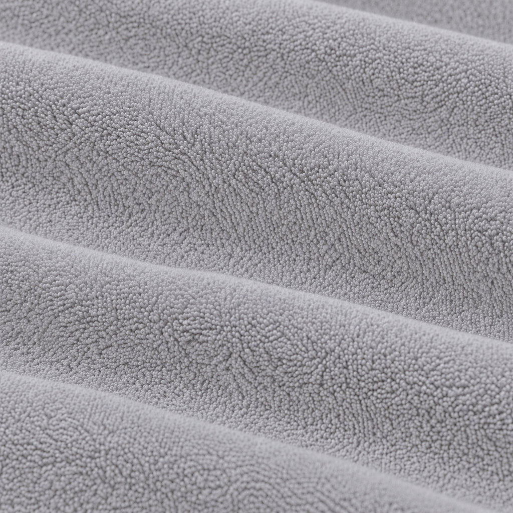 Close-up of the grey Terry Mattress Protector fabric texture