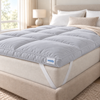 Grey mattress topper with corner strap and Westy Home label
