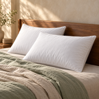 Two white Regular Microfiber Pillows on an ivory bed