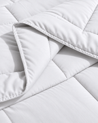 Westy Home White Solid microfiber comforter folded edge close-up