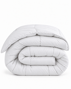 Westy Home White Solid microfiber comforter folded on white background
