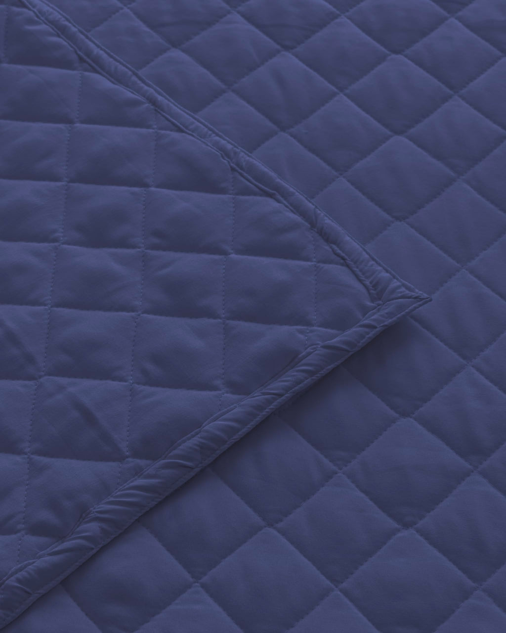 Westy Home quilted dohar, Navy Blue, fabric stitching closeup