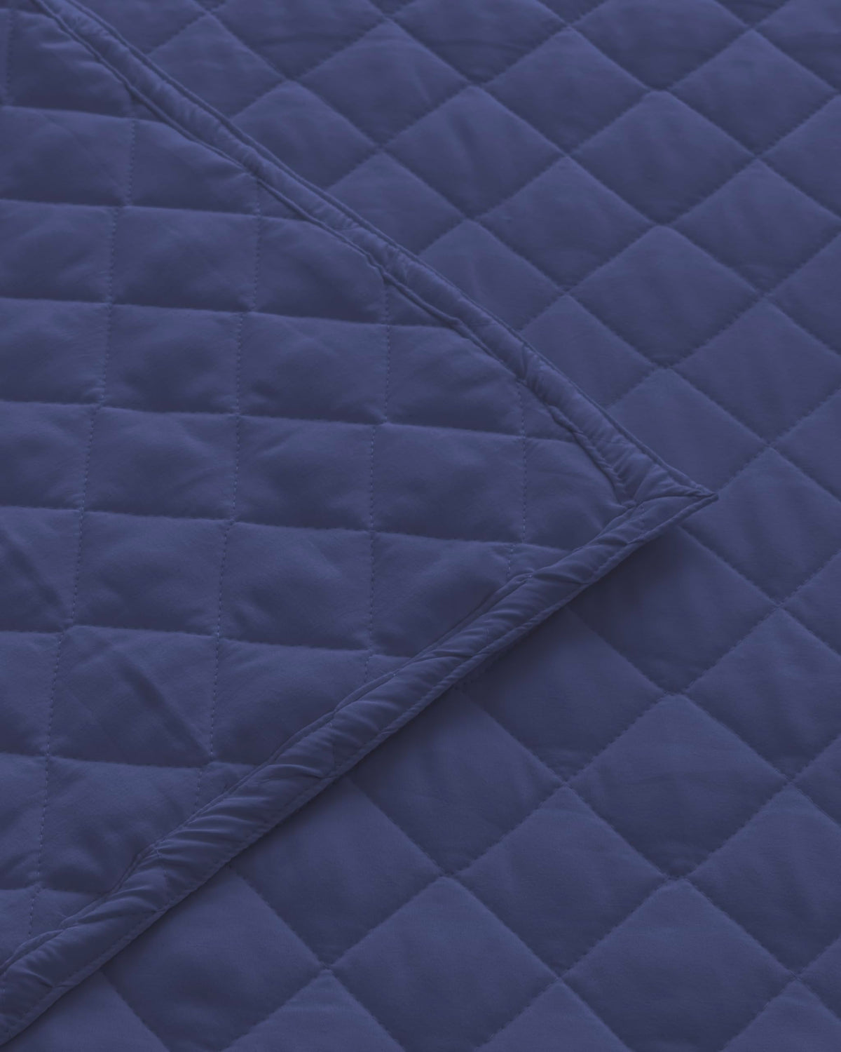 Westy Home quilted dohar, Navy Blue, fabric stitching closeup